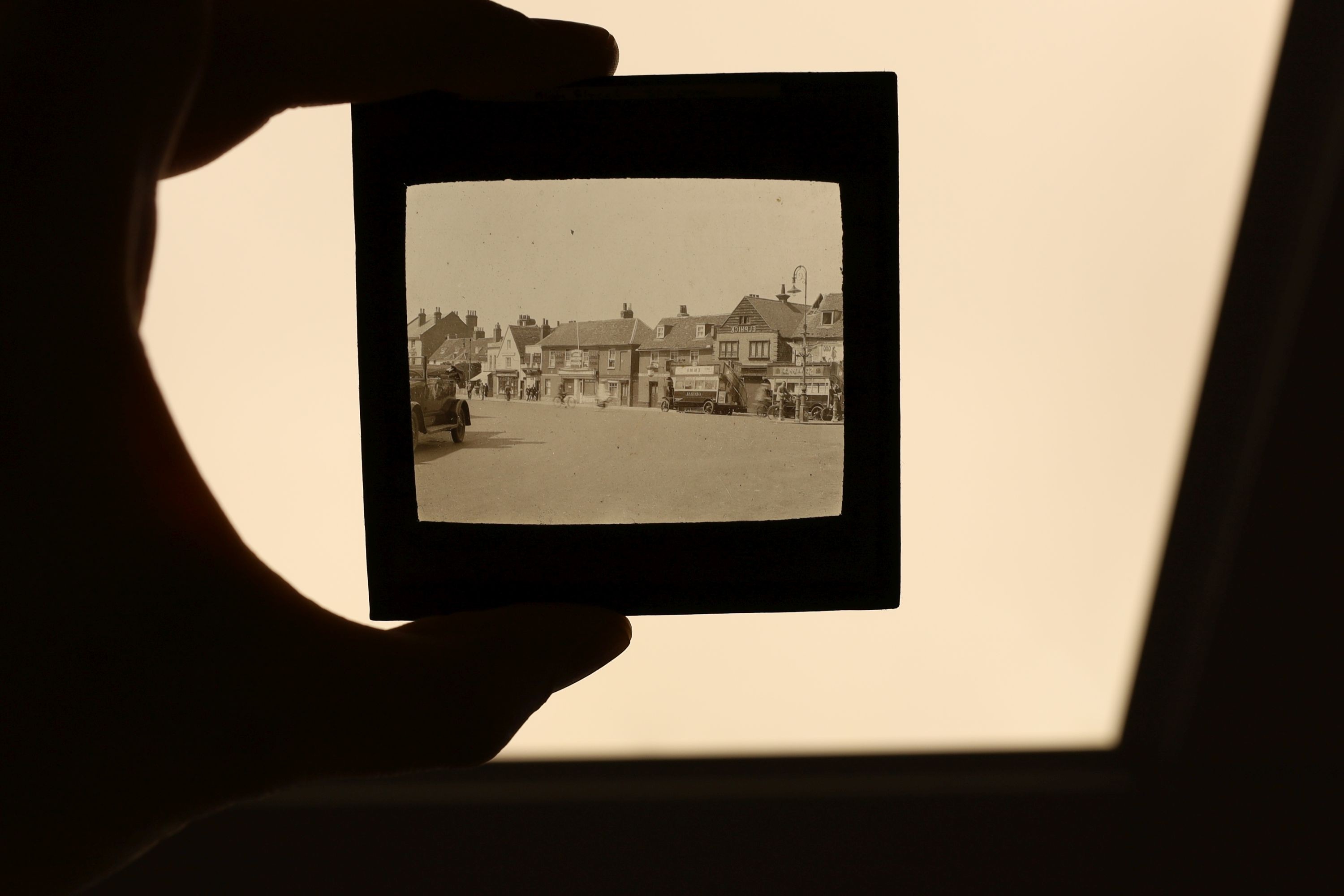 A late 19th century Magic lantern, cased with slides